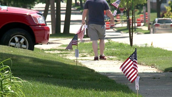 Thousands of American flags placed throughout St. Francis to celebrate 4th of July