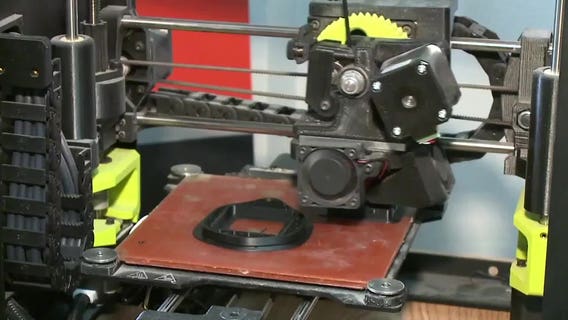 'A way we can help:' 3D printers helping create face shield masks for medical workers