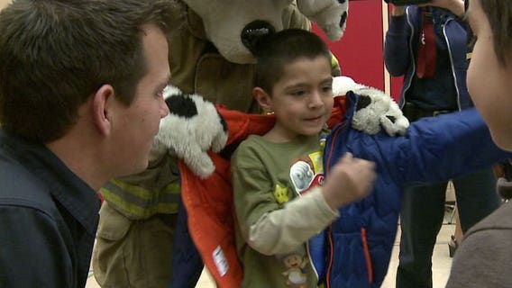 "It makes us feel great!" Milwaukee firefighters deliver coats collected during "Warm Up Winter" campaign