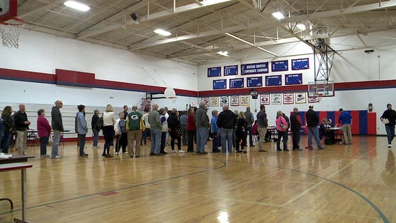 Voters deal with long lines in Waukesha County before polling locations open on Election Day