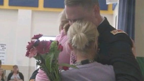 VIDEO: Army captain surprises wife, daughter at school