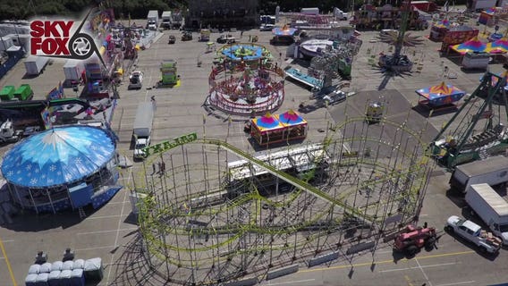 Workers prep and inspect rides at Wisconsin State Fair