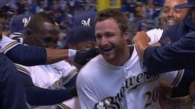 Brewers edge Rockies in 10 innings on Opening Day, 5-4