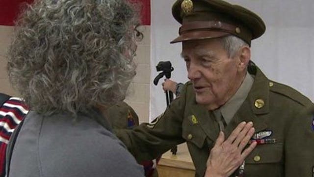 World War II veteran surprised with victory medal