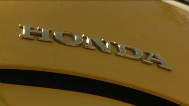 Bright yellow Honda crashes Harley-Davidson block party