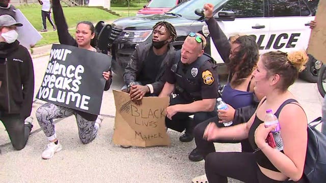 Law enforcement joined protesters in march through Waukesha after George Floyd's death