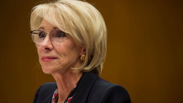 Education Secretary Betsy DeVos defends policy boosting virus aid for private schools