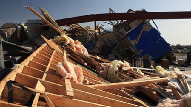 More than a dozen dead in tornado outbreak that tears through U.S.