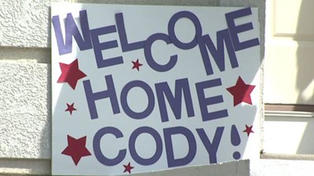 Menomonee Falls Marine returns home to surprise welcome