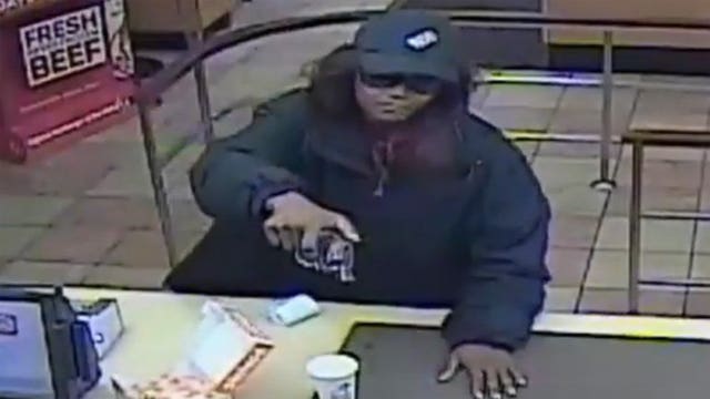 Caught on camera: Woman pulls gun on restaurant worker in attempted robbery