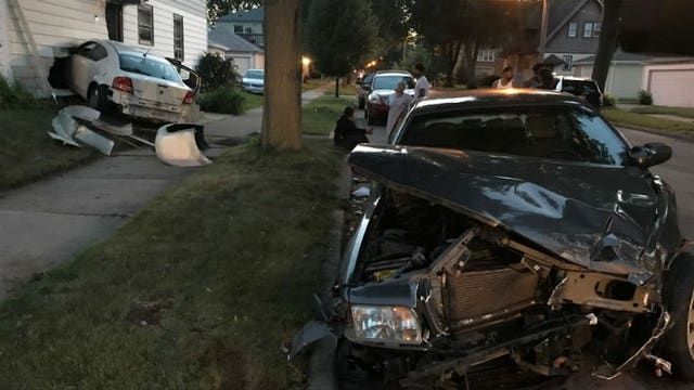 Police investigate crash involving 2 vehicles, 1 that struck home near 45th and Auer