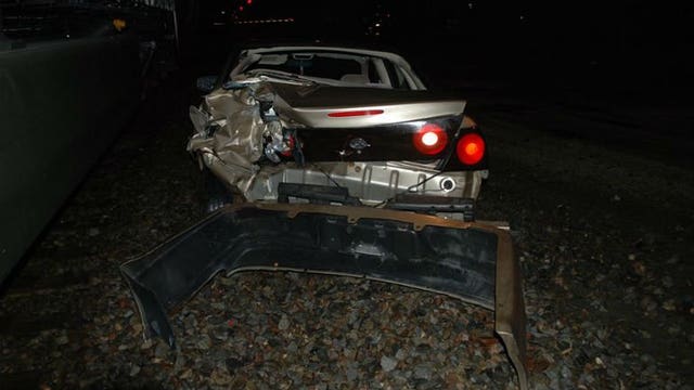 Freight train strikes car on tracks in Waukesha
