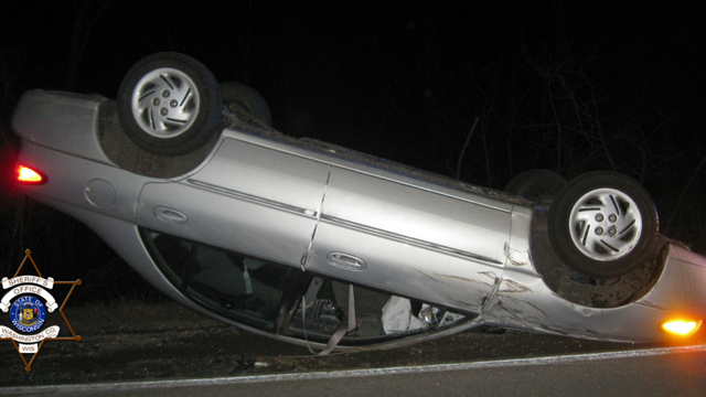 "First time I've had it happen:" Car rolls over after slamming into boulder on highway