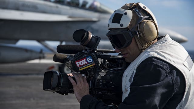 On board the aircraft carrier USS Eisenhower; one of the "most dynamic working environments"