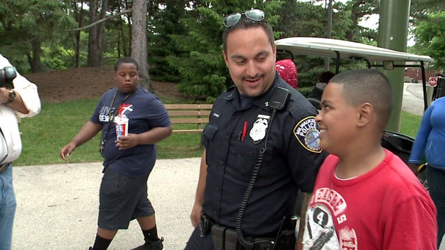 "We get to hang out:" MPD officers have fun with kids at the Milwaukee County Zoo