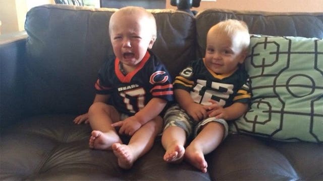 One picture says it all: Packers dominate Bears, twin brothers share the moment
