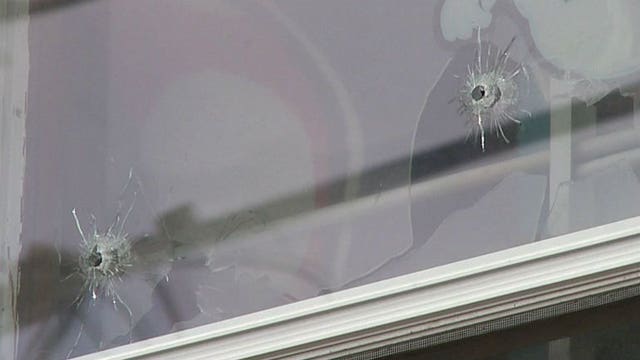 Police: Woman struck by bullet while asleep in bed near 20th and Burleigh