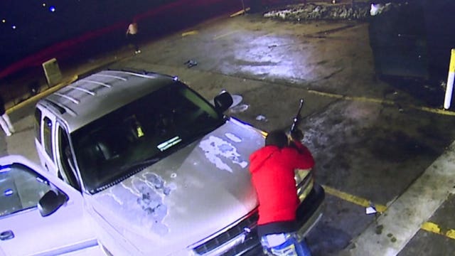 'Guns don't solve anything:' Gas station gun battle caught on camera; 2 wounded