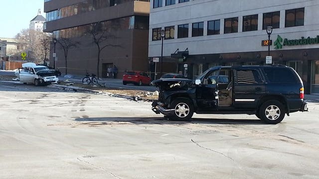 Armed robbery leads to police pursuit and crash in downtown Milwaukee