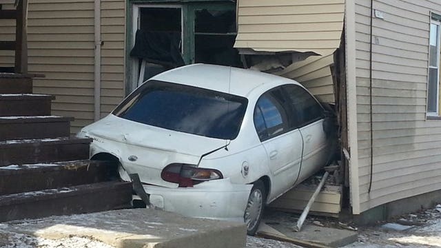 Hit-and-run crash sends car into home on Milwaukee's south side