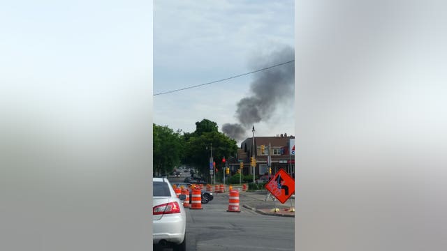 Developing: Firefighters battling fully-involved garage fire; smoke seen from I-43