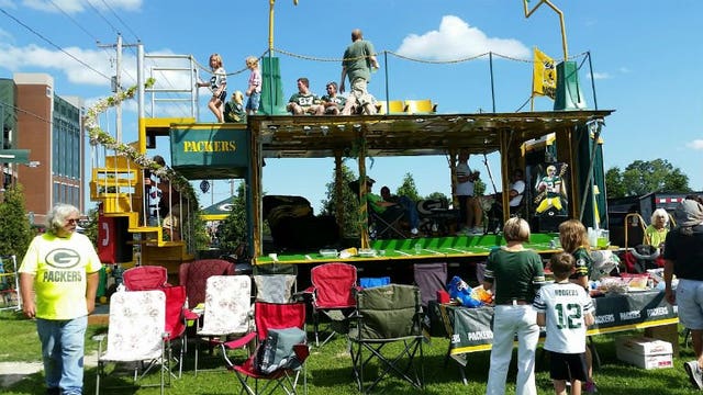 At Lambeau for Family Night -- the ultimate tailgating paradise! "My husband, he's a little over the top!"