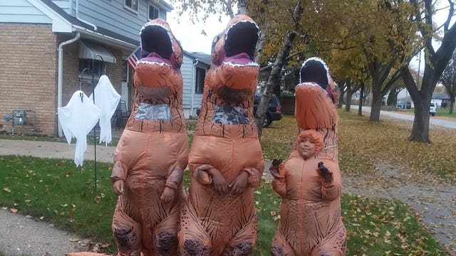 Social distancing dinosaur parade in Bay View Sunday afternoon