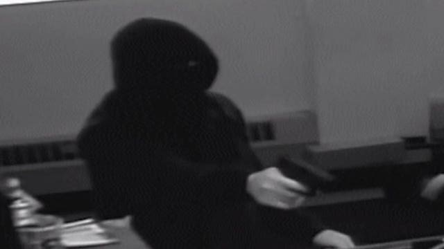 Can you help? Police seek suspect after armed robbery at north side post office