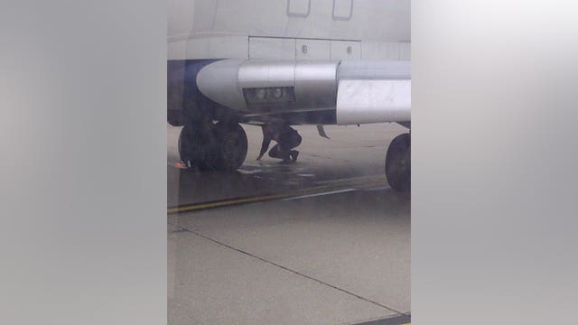 Airplane experiences "hard landing" after tire blows at airport
