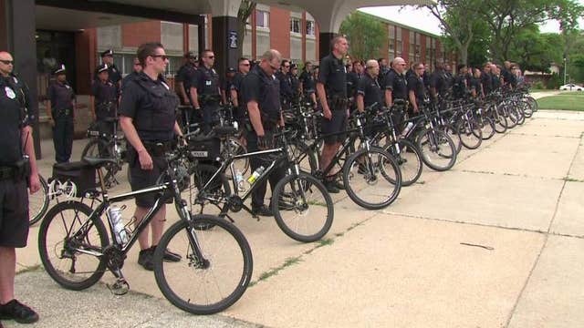"There are people we need to protect:" MPD holds roll call in the street as school year ends