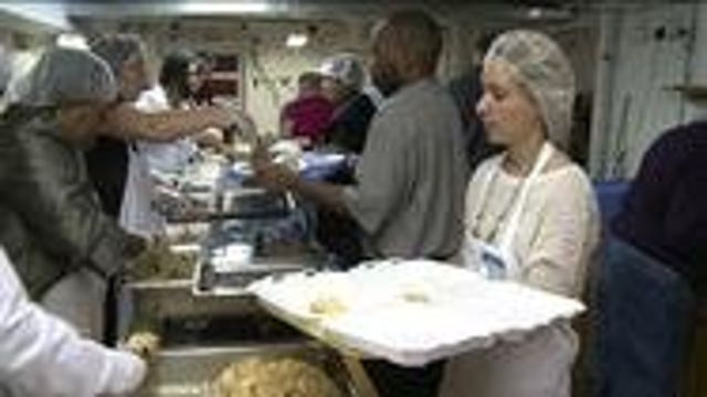 Church organizations provide Thanksgiving outreach meal
