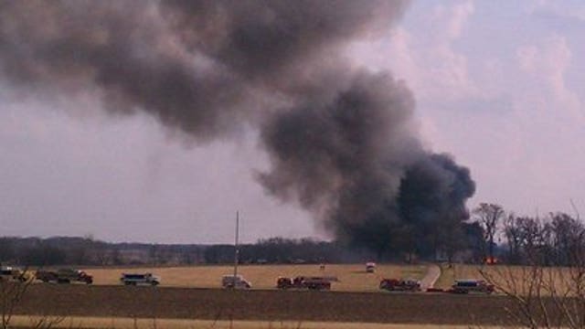 Firefighters battle barn fire in Town of Randall