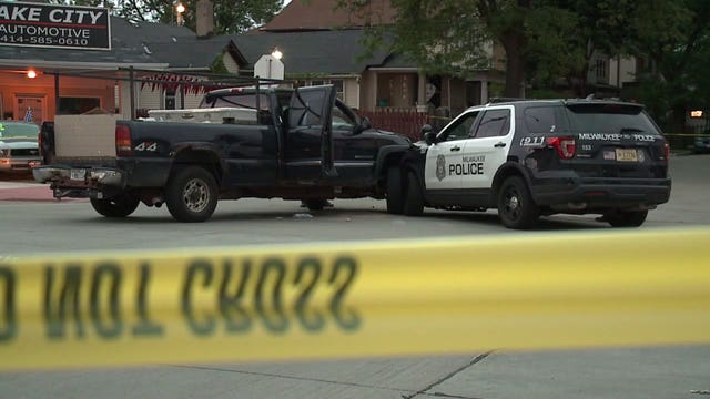 Police: Impaired man hid in tree after hitting MPD squad, running from crash that injured 2 officers