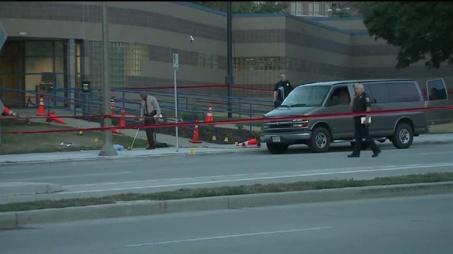 Man shot and killed outside police station, residents express shock