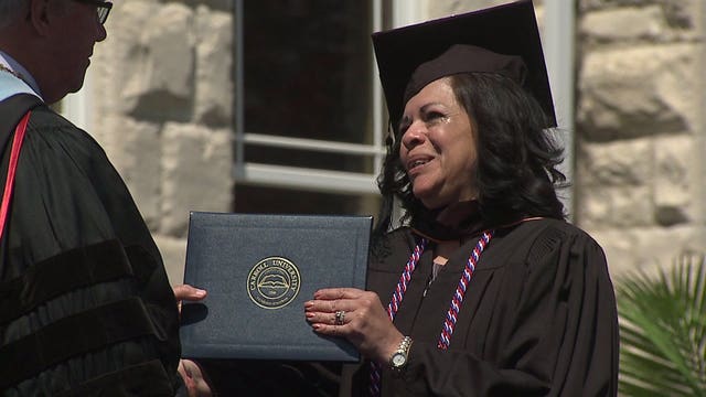 "So exciting!" She started college 35 years ago, and on Mother's Day, she finally graduated!