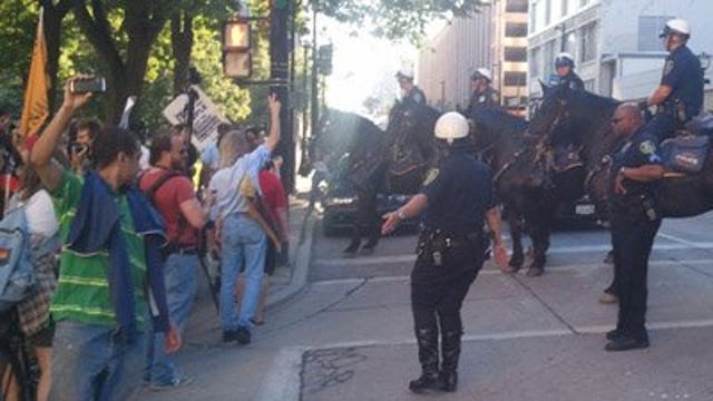 Five arrested after anti-Walker, Occupy Movement march