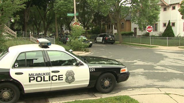 Police: One in custody after likely drug-related robbery, officers shoot and kill "charging" pit bull