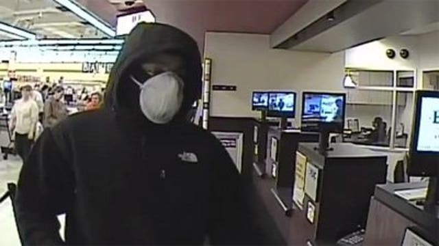 Masked & ready to rob: Police look for help to identify suspect