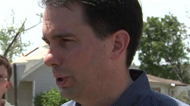 Gov. Scott Walker tours storm damage in La Crosse