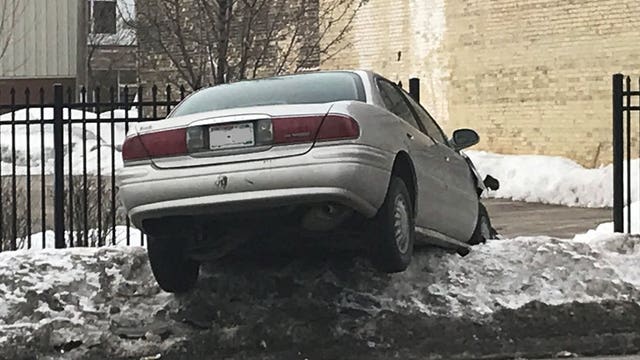 Milwaukee police: Officer's squad struck on way to injury accident, nobody hurt