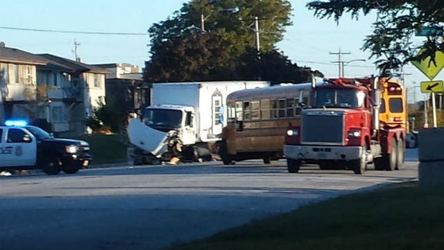 Semi and school bus collide near 13th and Layton