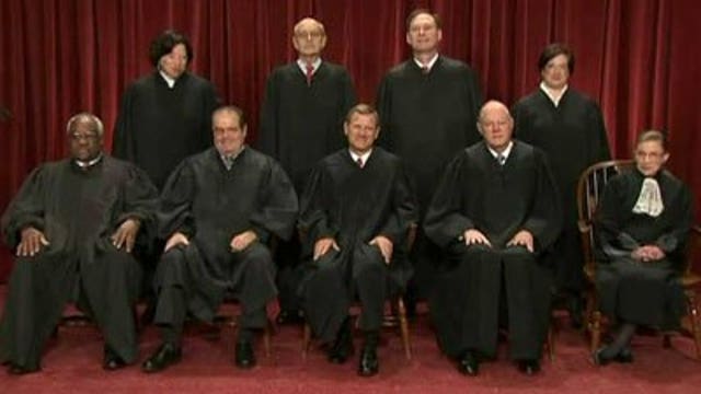 Battle over Obama health care law reaches Supreme Court