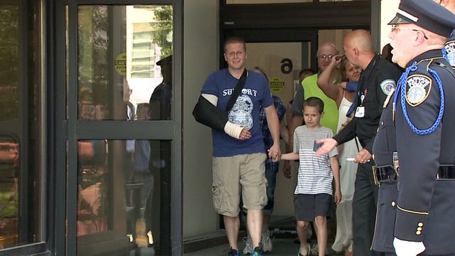 Two men charged in connection with Milwaukee officer's shooting