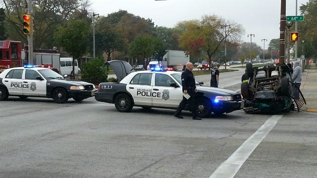 Vehicle ends up on its roof following crash near 64th and Silver Spring Drive
