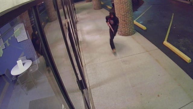 Caught on camera: Police release surveillance photos of suspect in Cricket Wireless robbery
