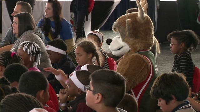 Milwaukee Bucks players, coaches and Bango encourage children to read