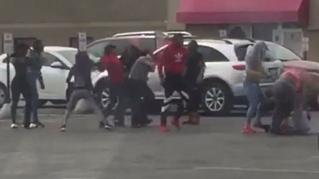 'He got a gun, y'all:' Brawl at Family Dollar spills out into the parking lot -- caught on camera