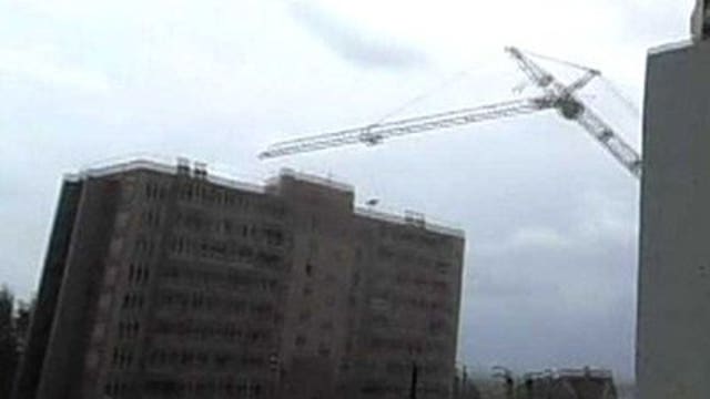 VIDEO: Crane collapses during construction of apartment building