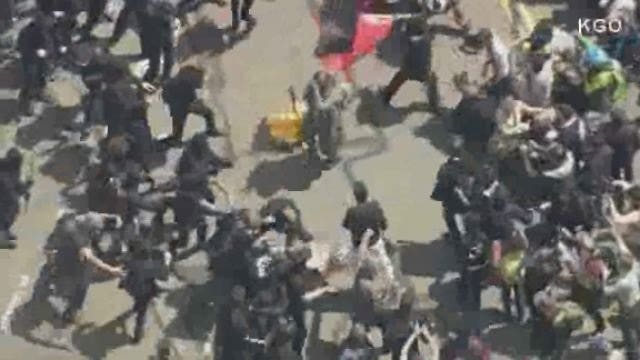 13 arrested in pro and anti-President Trump rallies