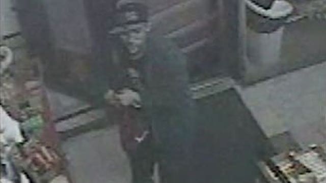 Can you help? Police look to identify two suspects who robbed National Food and Beer at gunpoint